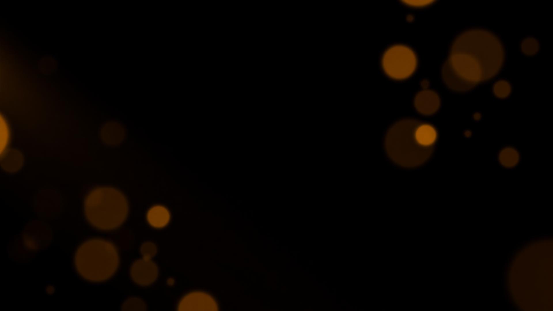 Golden light particles on black — Easy Day Alliance